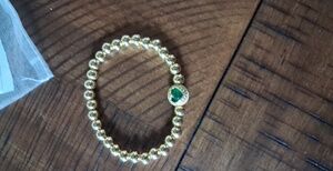 Elegant Gold Beaded Bracelet with Green Heart Charm